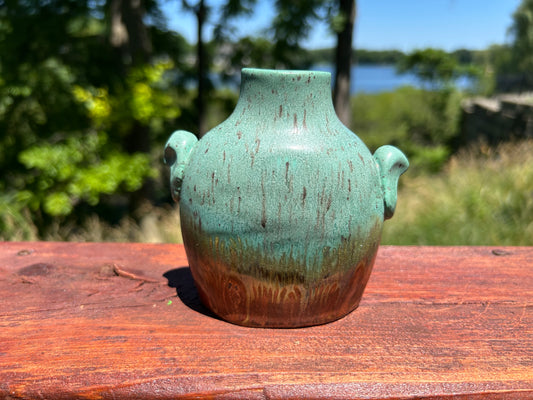 Decorative green and copper bottle